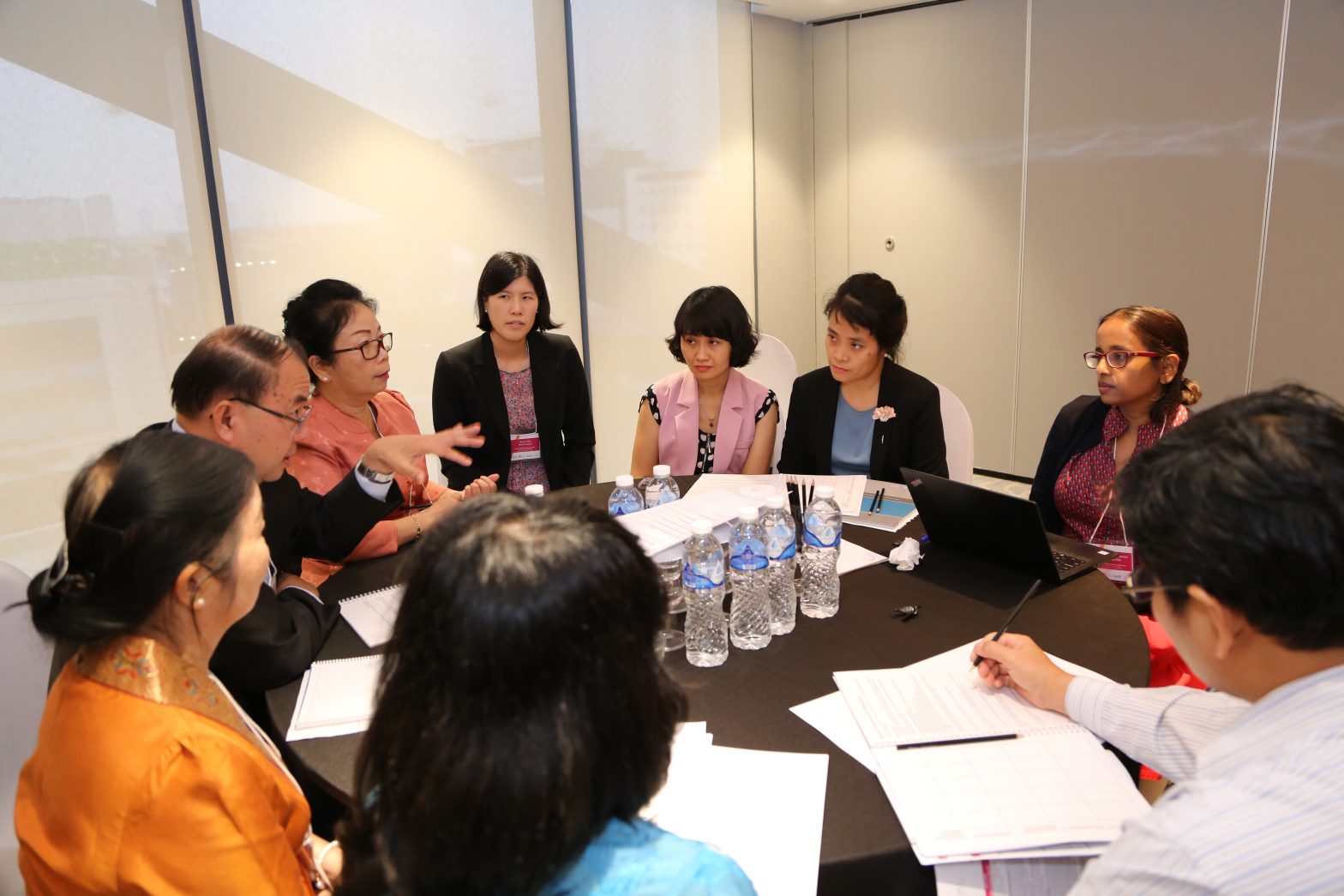 Health policy and research professionals from the Asia region discuss process improvements at a roundtable