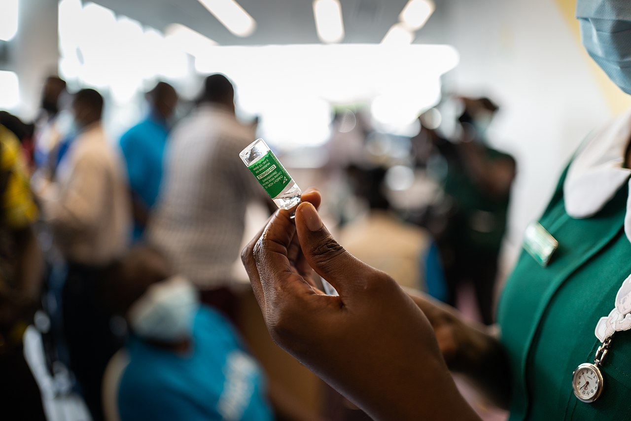 COVAX rollout: COVID-19 vaccinations begin in Ghana - nurse prepares vaccine