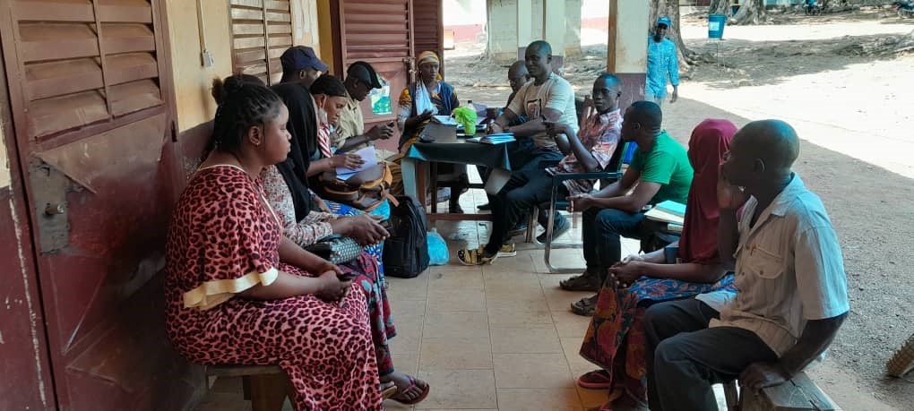 Community health workers in Guinea gather for a workshop